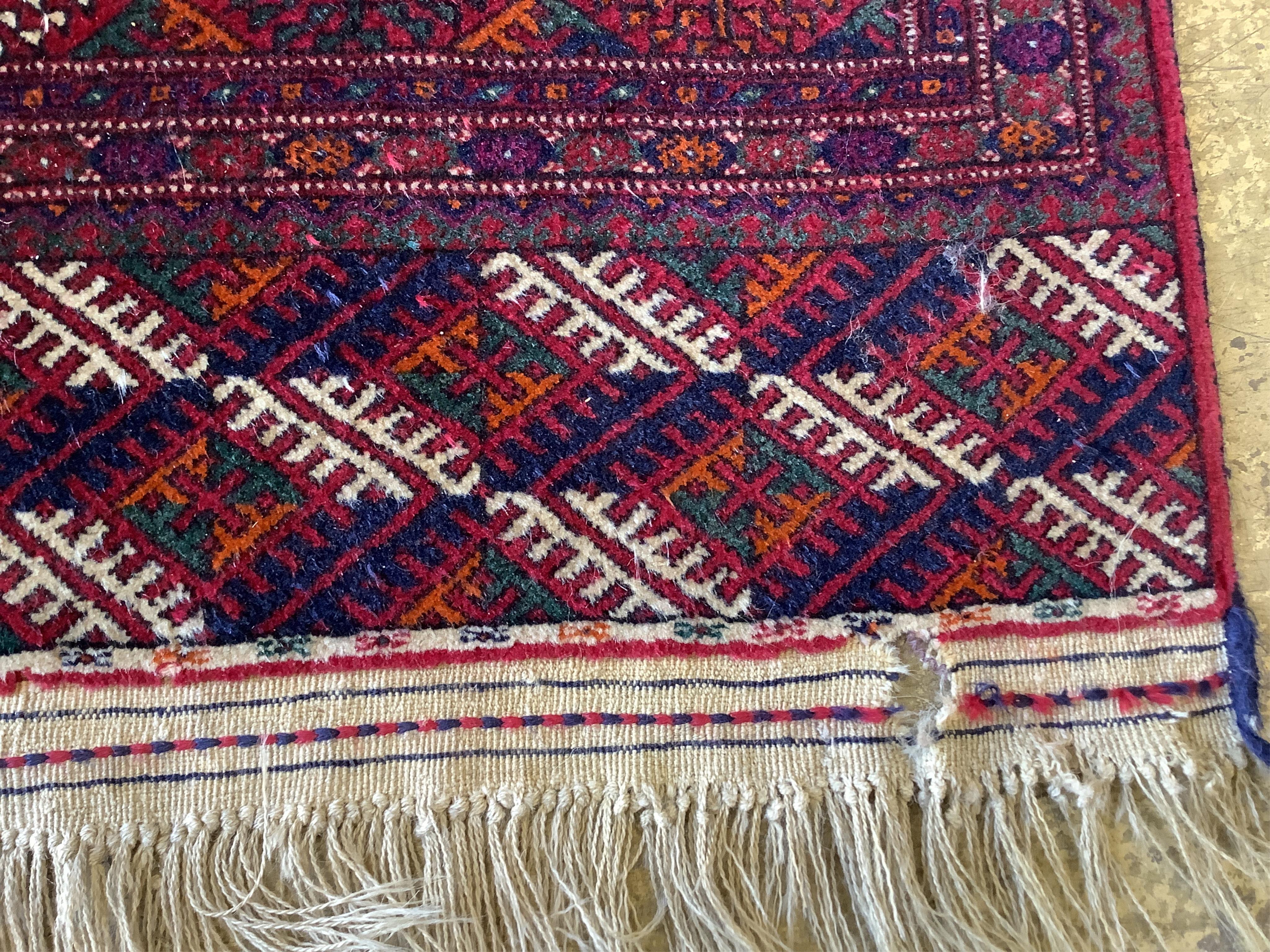 A modern Bokhara red ground rug, 253 x 165cm. Condition - good